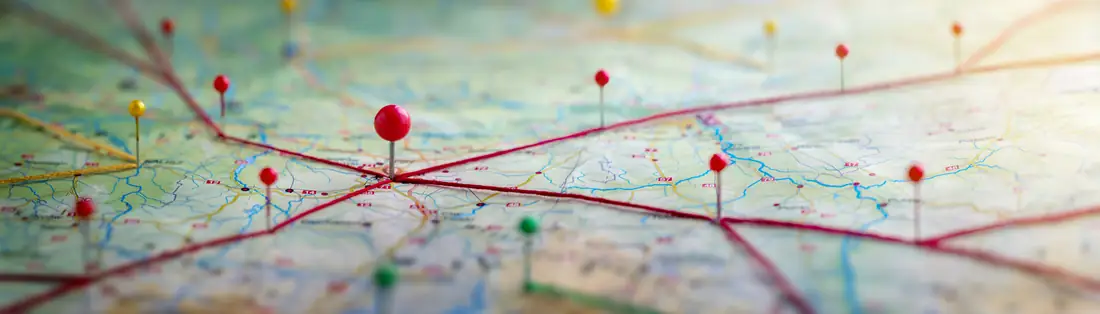 A map dotted with red location pins connected by route lines, standing for the communities across Central Ohio where we manage property